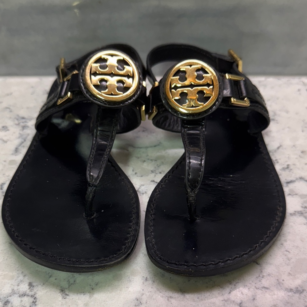 Tory Burch Black and Gold medallion Sandals size 5